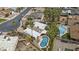 An aerial view of home featuring a private swimming pool, mature trees, and a well-manicured backyard at 2916 S Revere Cir, Mesa, AZ 85210