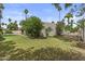 Exterior view of a yard with green grass and landscaping at 2916 S Revere Cir, Mesa, AZ 85210