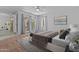 This bedroom offers a view of the backyard and outdoor living space, plus a large bed and neutral color palette at 2916 S Revere Cir, Mesa, AZ 85210