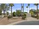 Street view of a beautiful home featuring mature landscaping and a well-manicured front yard at 2916 S Revere Cir, Mesa, AZ 85210