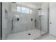Bright modern bathroom with a large glass shower and tile surround at 2994 E Mahogany Pl, Chandler, AZ 85249