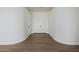 Bright foyer with hardwood floors and double doors to a bedroom or office space at 2994 E Mahogany Pl, Chandler, AZ 85249
