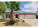 Charming home with well-manicured front yard, desert landscaping and spacious three car garage at 2994 E Mahogany Pl, Chandler, AZ 85249