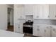 Close up of a chef's kitchen with stainless steel appliances and white shaker cabinetry at 2994 E Mahogany Pl, Chandler, AZ 85249