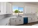 Kitchen features stainless steel appliances, white cabinets, and granite countertops at 2994 E Mahogany Pl, Chandler, AZ 85249