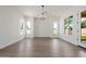 Bright living room showcases recessed lighting, wood-look floors, and large windows at 2994 E Mahogany Pl, Chandler, AZ 85249