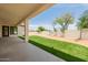 Wide covered patio leading to a lawn and backyard at 2994 E Mahogany Pl, Chandler, AZ 85249