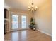 Bright dining area with French doors leading outside; adjacent to kitchen at 3133 E Claire Dr, Phoenix, AZ 85032