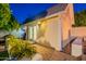 Back house featuring backyard access and a built-in gas grill at 3133 E Claire Dr, Phoenix, AZ 85032