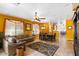 Cozy living area featuring a comfortable sofa, open floor plan, and lots of natural light at 31716 N Poncho Ln, San Tan Valley, AZ 85143
