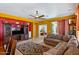 Bright living room featuring a cozy couch, and a view to the dining room and kitchen at 31716 N Poncho Ln, San Tan Valley, AZ 85143