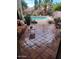 Back patio has seating area and leads out to a stunning pool and garden at 3212 E Desert Cove Ave, Phoenix, AZ 85028