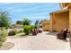 Spacious backyard with paved patio, comfortable seating, and lush landscaping for outdoor enjoyment at 3358 W Sandra Ter, Phoenix, AZ 85053