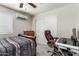 Bedroom featuring neutral walls, carpeted floors, and a desk at 3358 W Sandra Ter, Phoenix, AZ 85053
