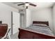This is a cozy bedroom with neutral walls, carpeted floors, and closet at 3358 W Sandra Ter, Phoenix, AZ 85053