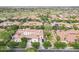 An aerial view showcases the expansive community and surrounding area at 3521 N Hooper St, Buckeye, AZ 85396