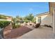 Backyard patio with outdoor seating and a charming fire pit area at 3521 N Hooper St, Buckeye, AZ 85396