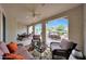 Outdoor patio with comfortable seating, ceiling fan, and open views to the backyard at 3521 N Hooper St, Buckeye, AZ 85396