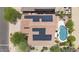 Aerial view of house featuring pool, patio, desert landscaping, and solar panels on roof at 35746 N 32Nd Ln, Phoenix, AZ 85086