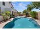 Beautifully designed pool with a waterfall feature in a private backyard at 35746 N 32Nd Ln, Phoenix, AZ 85086