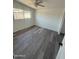 Bedroom with natural light, hard surface floors, and ceiling fan at 3824 W Puget Ave, Phoenix, AZ 85051