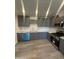 Gray kitchen featuring stainless steel appliances, grey cabinets and marble countertops at 3824 W Puget Ave, Phoenix, AZ 85051