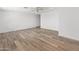 Bright living room features a ceiling fan and wood-look flooring at 3824 W Puget Ave, Phoenix, AZ 85051