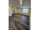 Living room with hard surface floors, ceiling fan, and recessed lighting at 3824 W Puget Ave, Phoenix, AZ 85051