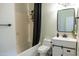 Bathroom with tub, shower, toilet, and vanity with matte black fixtures at 4187 N 298Th Ln, Buckeye, AZ 85396