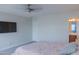 Primary bedroom featuring an ensuite bathroom, providing privacy and convenience at 4187 N 298Th Ln, Buckeye, AZ 85396