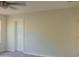 Bedroom with ceiling fan, carpet, and neutral walls at 4187 N 298Th Ln, Buckeye, AZ 85396
