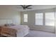 Inviting bedroom with a plush bed and a ceiling fan, creating a relaxing retreat at 4187 N 298Th Ln, Buckeye, AZ 85396