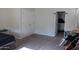 Bedroom featuring a double door closet, work desk, and neutral paint at 4187 N 298Th Ln, Buckeye, AZ 85396