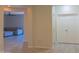 Inviting entryway leading to a spacious living room, creating a seamless transition within the home at 4187 N 298Th Ln, Buckeye, AZ 85396
