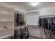 Walk-in closet with shelving and hanging storage at 4187 N 298Th Ln, Buckeye, AZ 85396