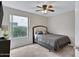 Bedroom with a neutral color palette and a large window for plenty of natural light at 4329 W Electra Ln, Glendale, AZ 85310