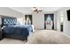 Cozy bedroom with ample light, dark curtains and a waterfall window view at 4329 W Electra Ln, Glendale, AZ 85310