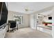Office featuring a work station, large window, and an entrance to a games room at 4329 W Electra Ln, Glendale, AZ 85310