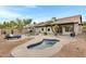 Backyard features a swimming pool, hot tub, lounge chair, and desert landscaping at 4329 W Electra Ln, Glendale, AZ 85310