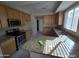 Bright kitchen featuring stainless steel appliances, granite counters, and ample cabinetry at 43455 W Chisholm Dr, Maricopa, AZ 85138