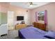 Cozy bedroom featuring a comfortable bed, a TV, and ample natural light at 439 N Cherry --, Mesa, AZ 85201