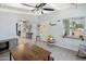 Inviting living area with a cozy ambiance featuring a ceiling fan and a large window at 439 N Cherry --, Mesa, AZ 85201