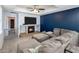 Cozy living room with a fireplace and a large sectional sofa perfect for relaxation at 439 N Cherry --, Mesa, AZ 85201