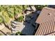 Aerial view of a backyard featuring a built in grill, dining set, outdoor seating and desert landscaping at 4519 N 29Th Way, Phoenix, AZ 85016