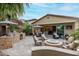 Beautiful backyard with a built-in BBQ, dining area, and inviting fire pit perfect for outdoor entertaining at 4519 N 29Th Way, Phoenix, AZ 85016