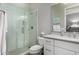 Elegant bathroom boasts modern glass shower, vanity and neutral finishes at 4519 N 29Th Way, Phoenix, AZ 85016