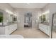 Bright bathroom boasts dual vanities, soaking tub, and serene bedroom view at 4519 N 29Th Way, Phoenix, AZ 85016