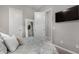 Cozy bedroom with ensuite mirror featuring bed and tv at 4519 N 29Th Way, Phoenix, AZ 85016