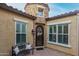 Elegant front entrance featuring an ornate wrought iron door and ample natural light at 4519 N 29Th Way, Phoenix, AZ 85016