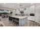 Spacious kitchen featuring a large island with bar seating and stainless steel appliances, perfect for entertaining at 4519 N 29Th Way, Phoenix, AZ 85016